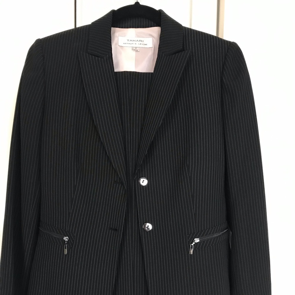 3 piece coat/Jacket Vest and pants.